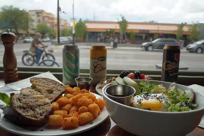 Breakfast of champions: A plate of eggs and a cold beer.