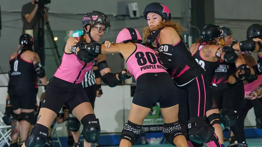 Purple Reina and Lil Spoon holding off the jammer!