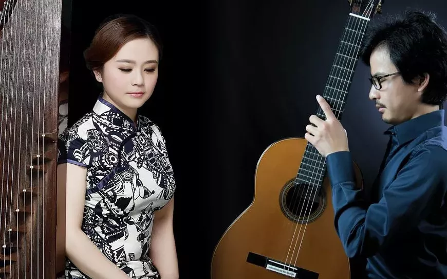 Jing Xia (guzheng) and Bin Hu (guitar)
