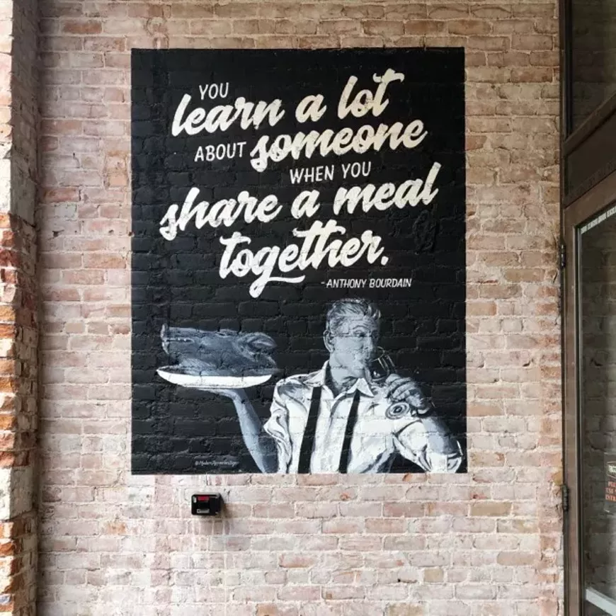 "You learn a lot about someone when you share a meal together" - Anthony Bourdain // Mural by Modern Aquarian , on the Ten55 patio