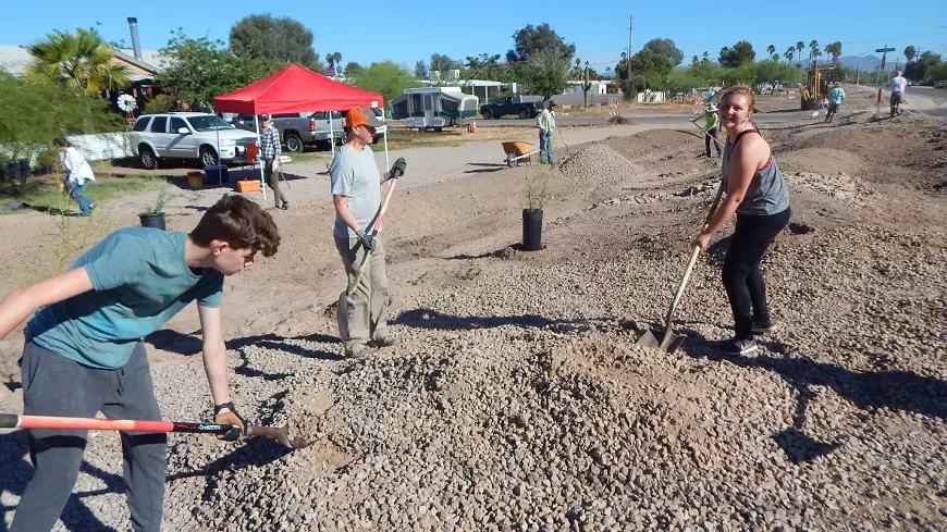 The project involves creating raingardens along the roadways that will both stop flooding and create a shady, beautiful community space.
