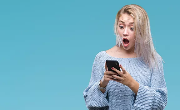 bigstock-young-blonde-woman-texting-sen-280453315.webp