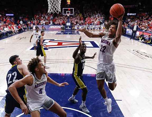 Arizona freshman forward Zeke Nnaji (22) scores a layup against Northern Arizona University Wednesday, Nov. 6. Nnaji had a game-high 20 points on 9-of-12 shooting for the Wildcats.