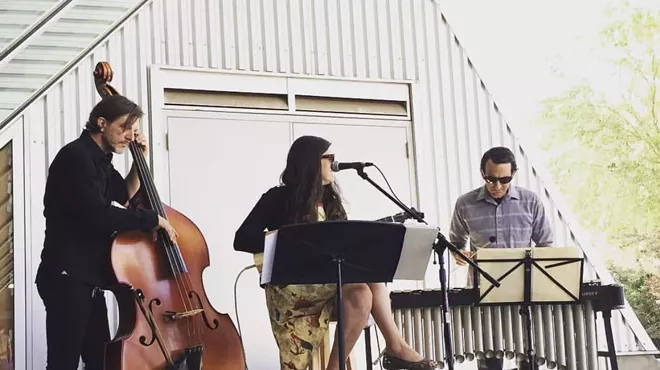 Image: Gabrielle Pietrangelo Trio in the courtyard at the Mercado