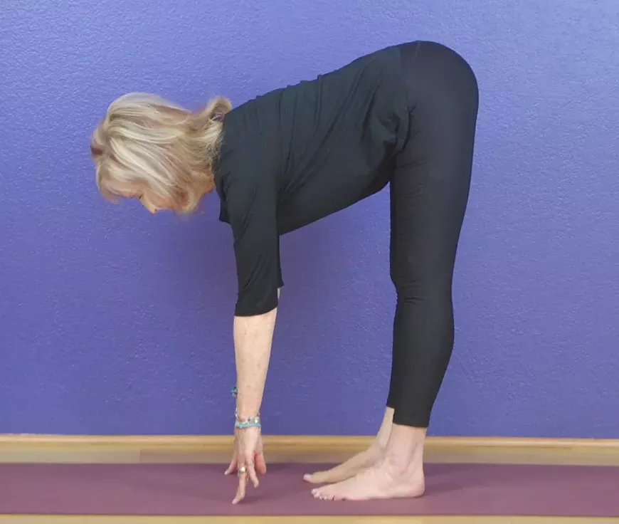 Traditional poses mark this ongoing yoga session.