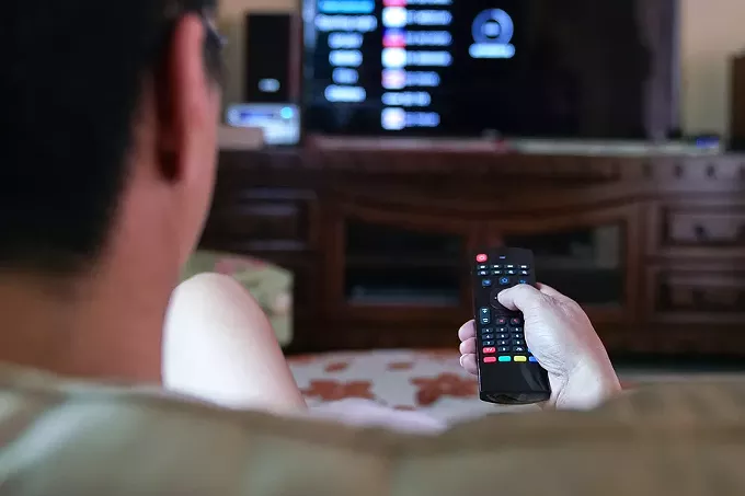 bigstock-man-watching-tv-with-focus-on--356826845.webp