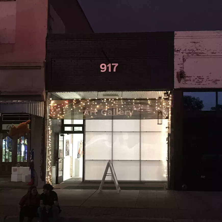 The gallery glows with art and art enthusiasts on Friday nights