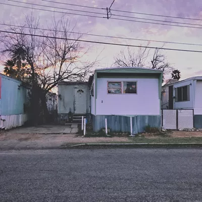 Image: Streets of This Town: Pink Sky Over Modular Homes