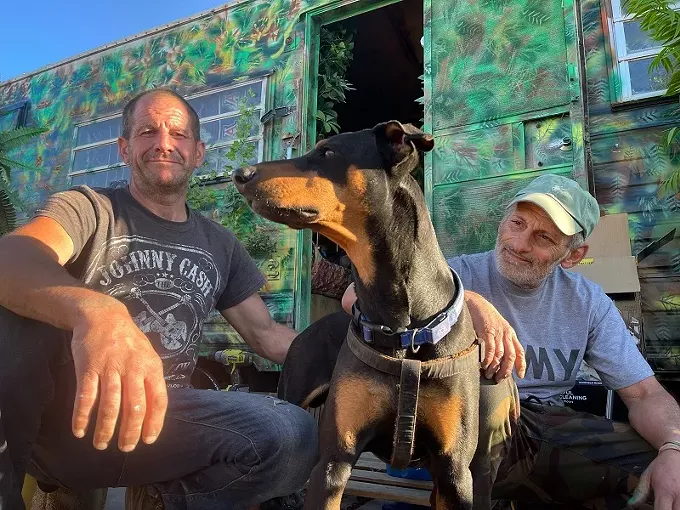 Scott Fisher (left) his pup Osso, and Frank Capanear.
